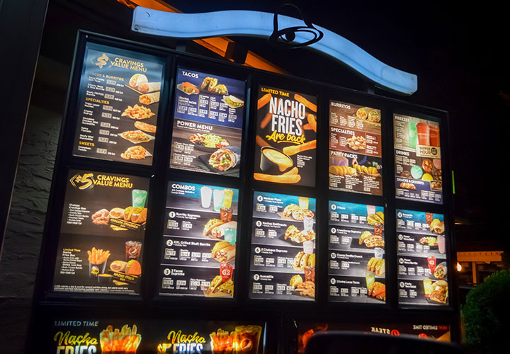 Taco Bell drive thru menu at night