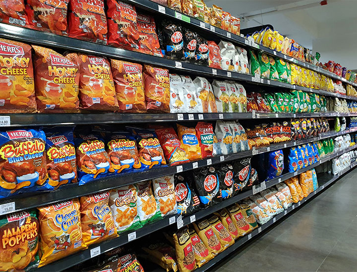 chip and snack aisle at grocery store