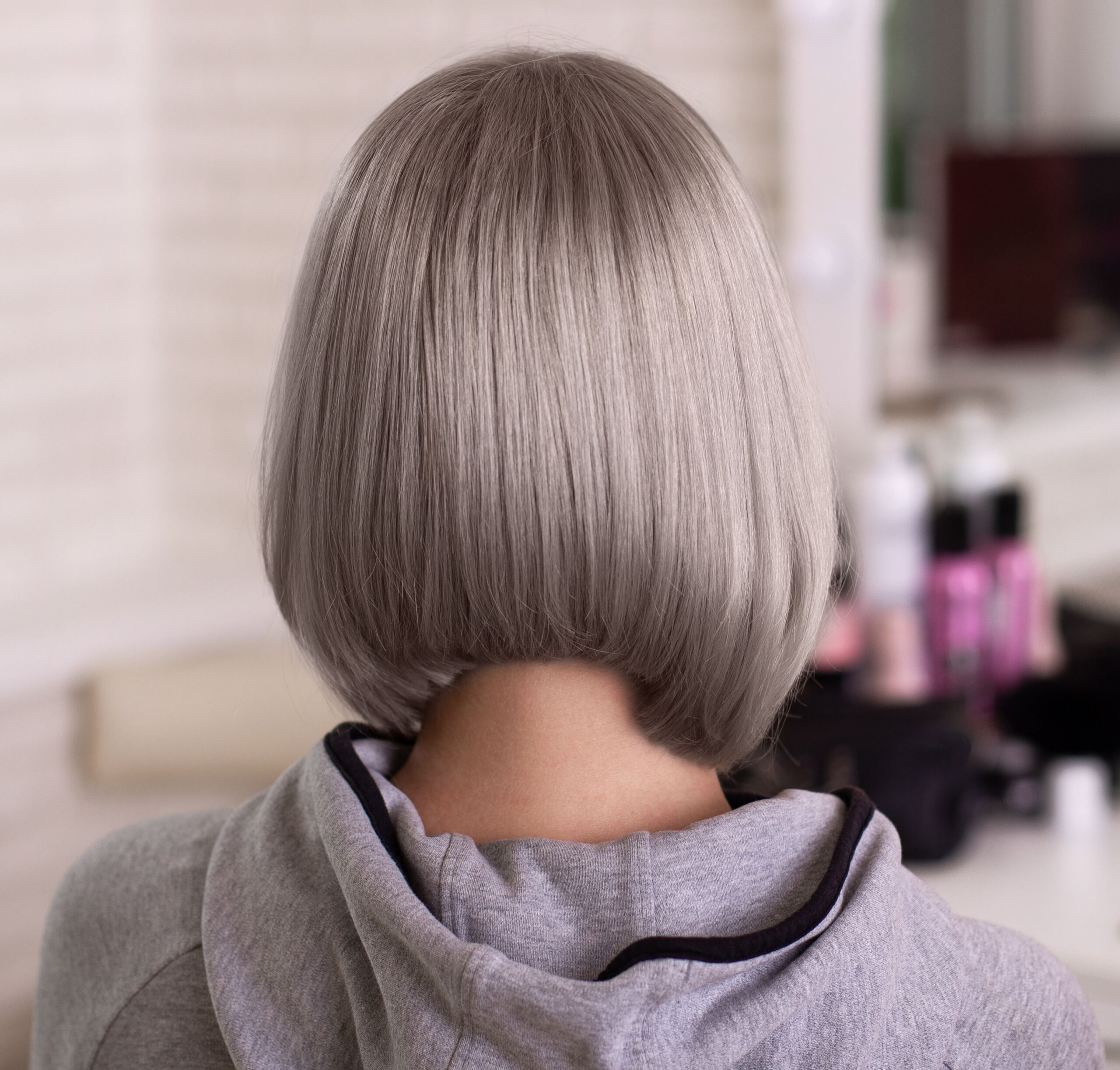 gray bob sleek scaled hairstyle salon smooth strands