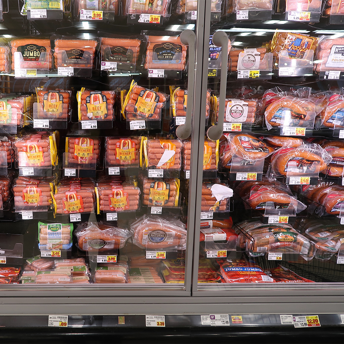 packages of hot dogs at grocery store