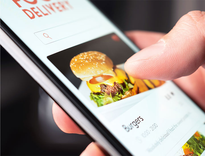 ordering fast food burgers on food delivery app