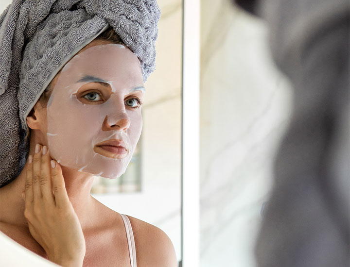 woman-doing-skincare-mask