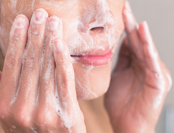 woman-washing-face