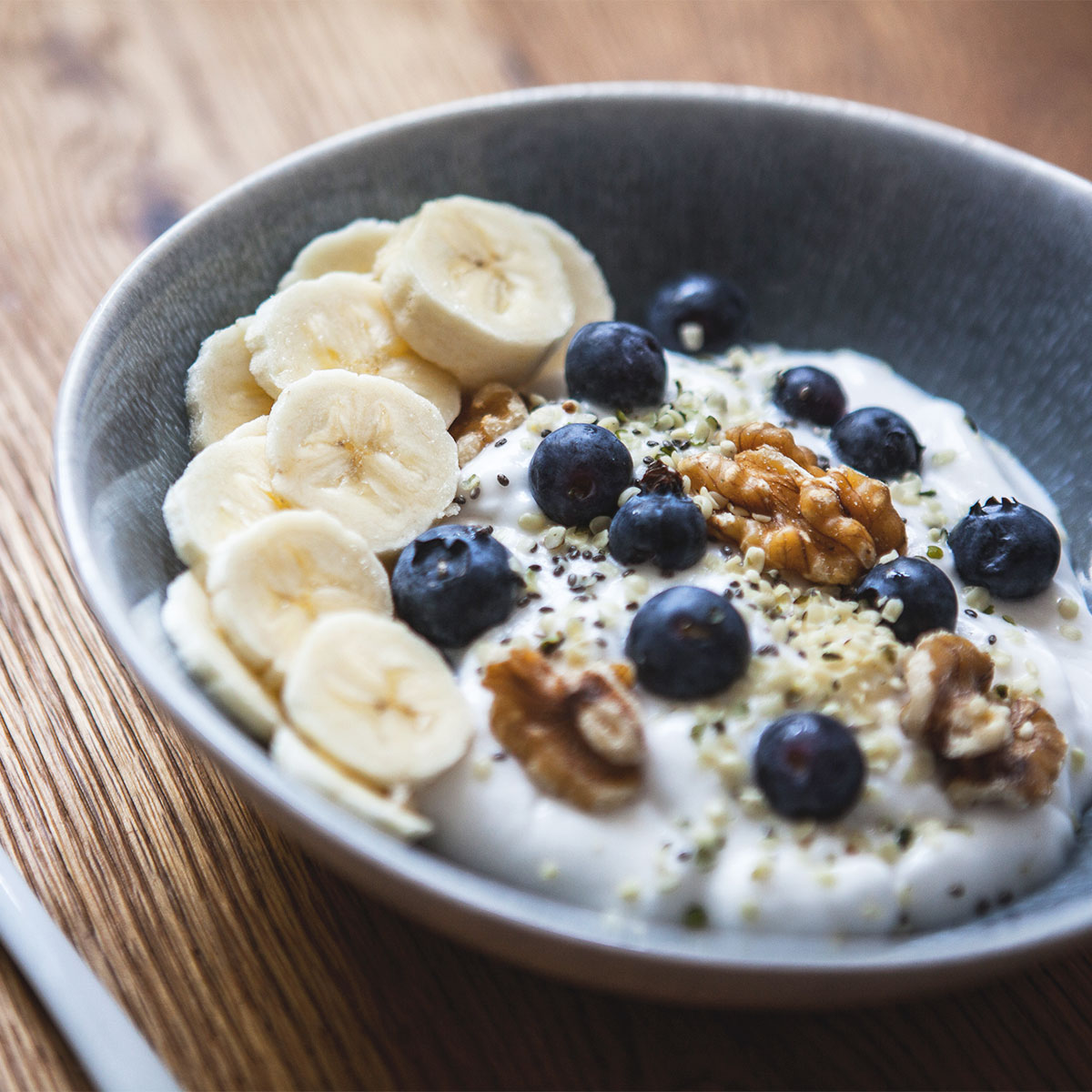 yogurt topped with blueberries and nuts