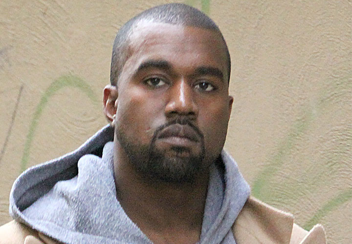 Kanye West in a grey hoodie