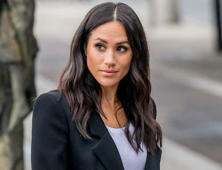 Meghan Markle black blazer wavy hair