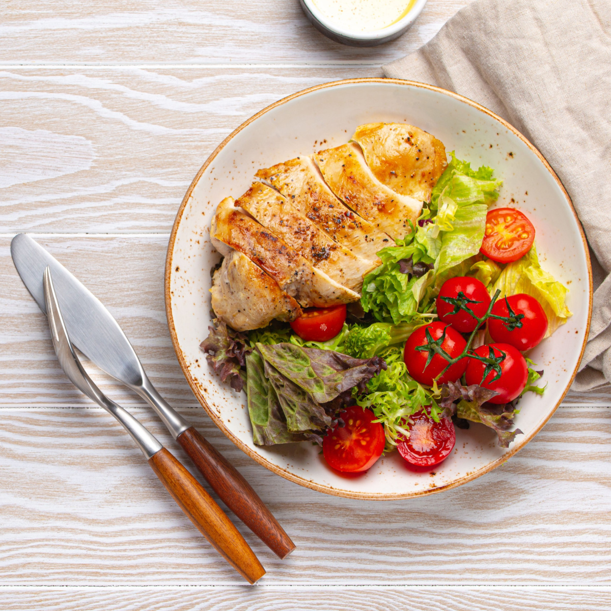 plate of chicken breast and veggies