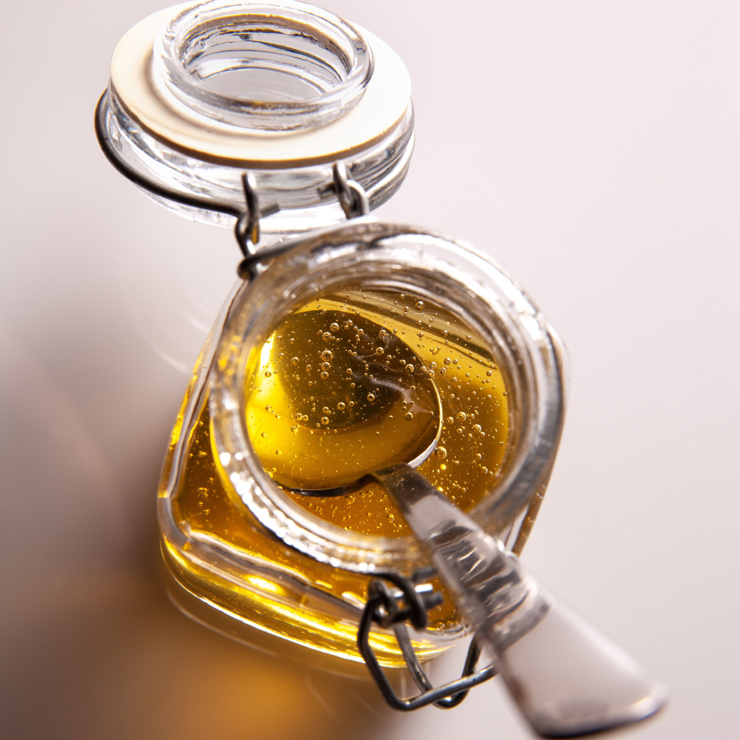 jar of agave nectar with spoon