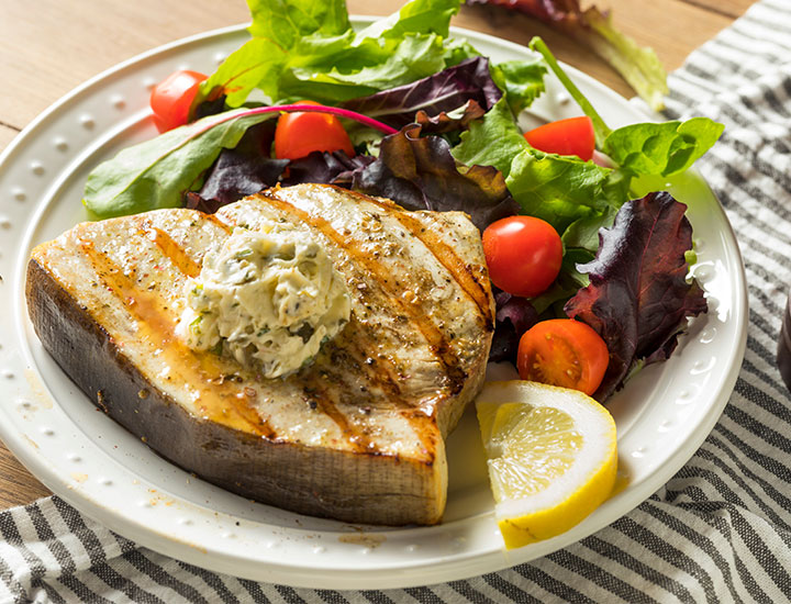 Swordfish steak on a plate