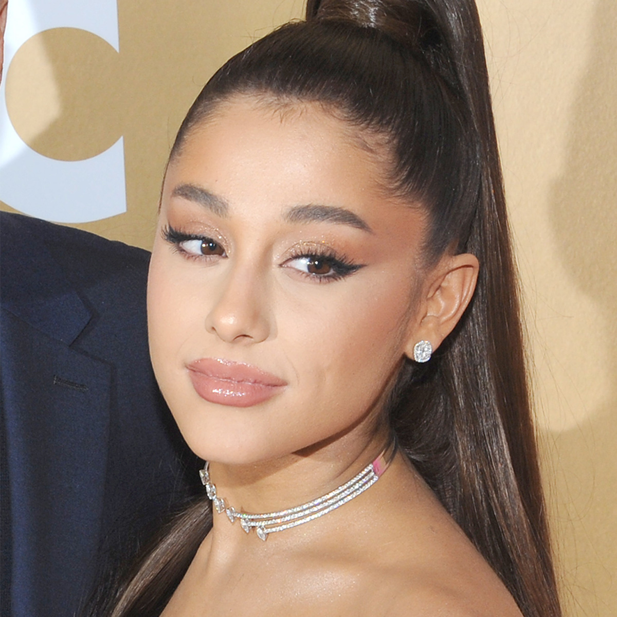 Ariana Grande Posts Stylish Photo In A Silver Dress As She Gets Emotional  Over Botox And Filler Use