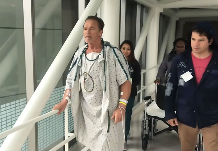 Arnold Schwarzenegger during hospital recovery