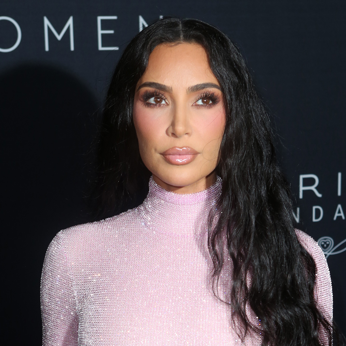 Celebrities Like Kim Kardashian Can't Stop Wearing This Bizarre Unbuttoned  Pants Trend - SHEfinds