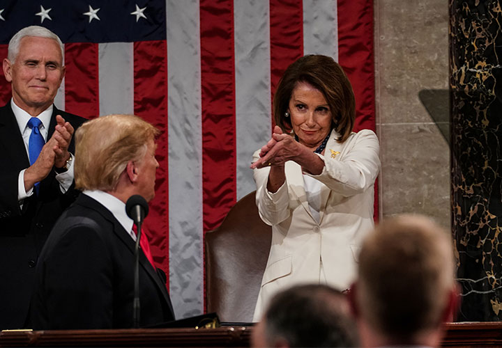 Nancy Pelosi claps at Donald Trump before he delivers the State of the Union address at the Capitol, 2019