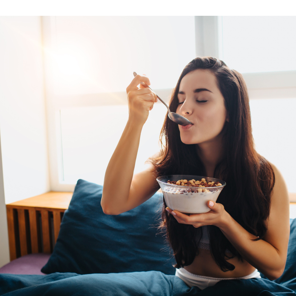 woman eating cereal