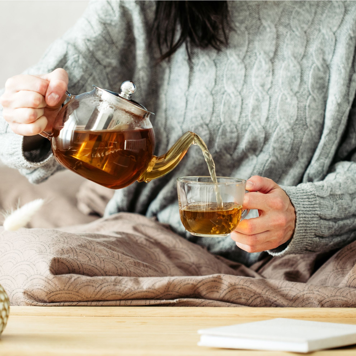 woman pouring green tea