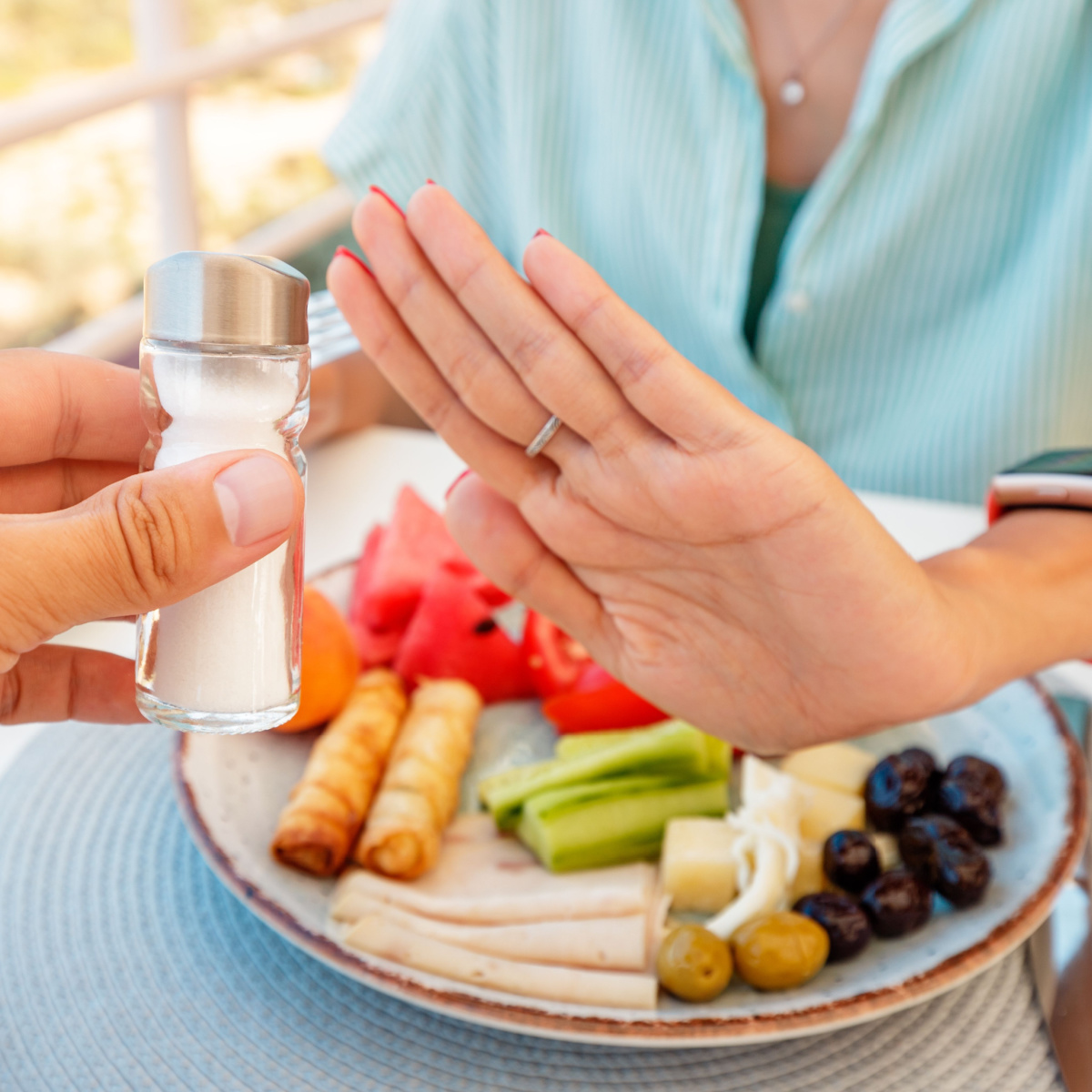 woman refusing salt