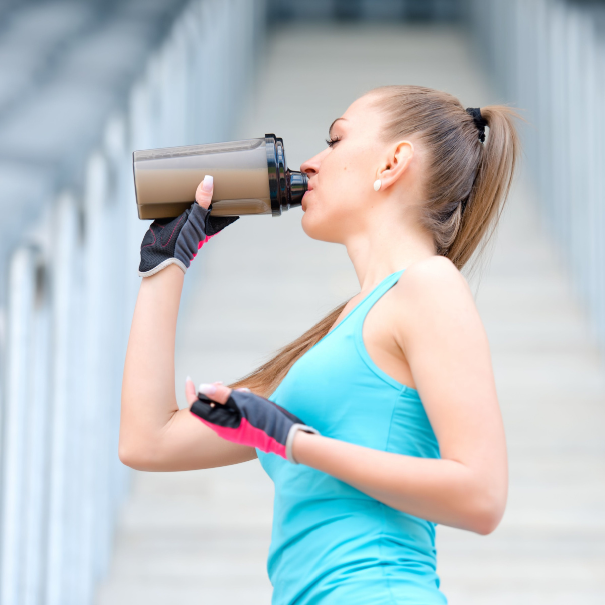 woman drinking protein shake