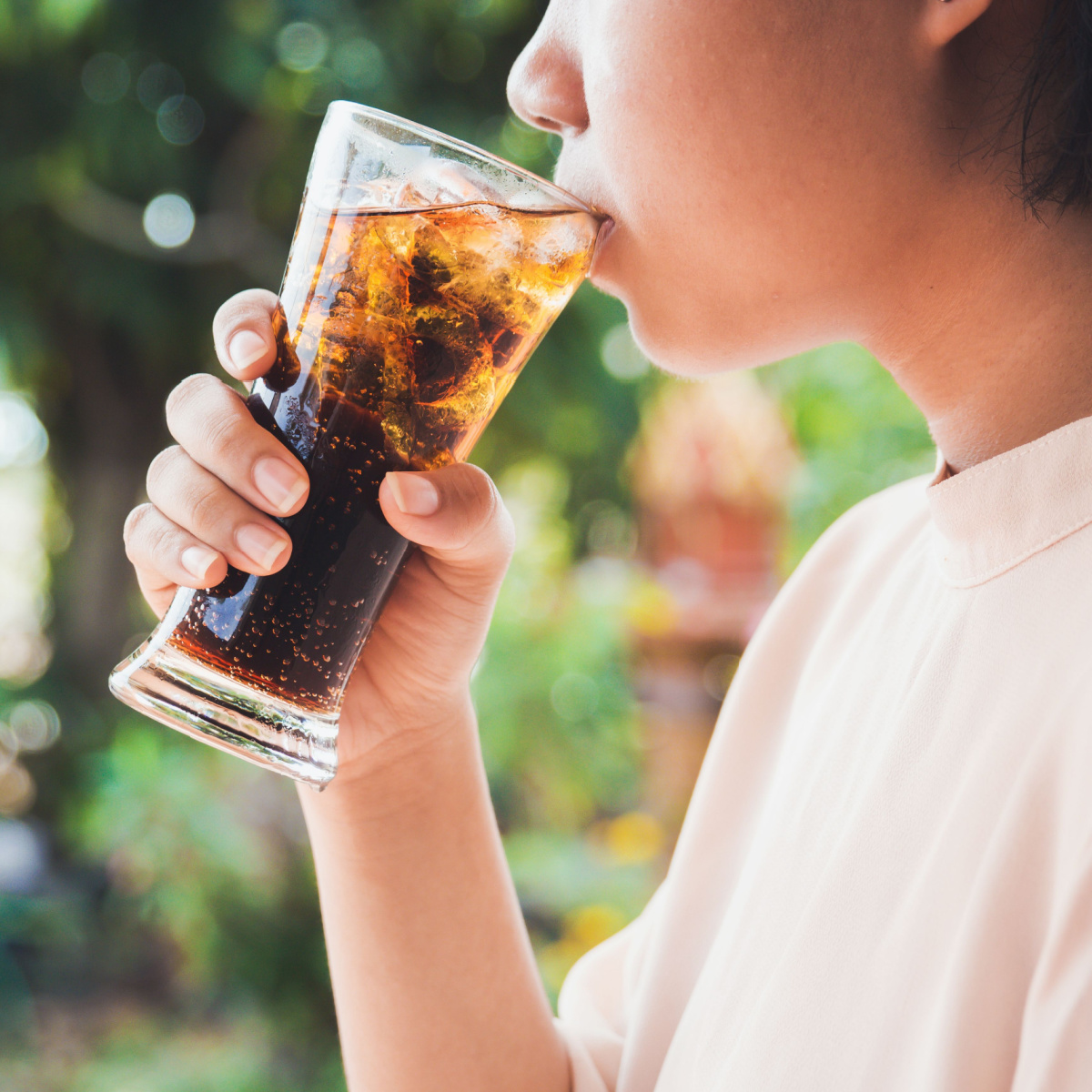 woman drinking soda