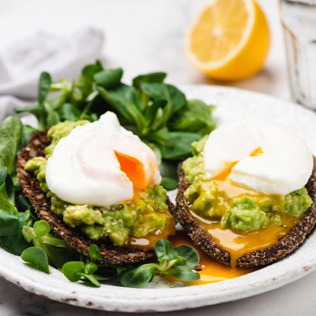 toast topped with avocado and eggs