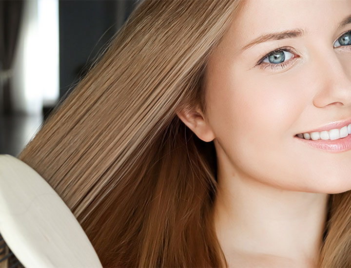 woman-brushing-her-hair