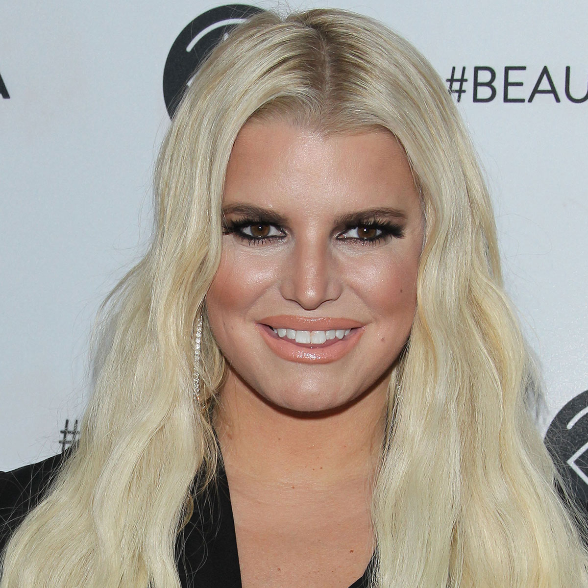 Jessica Simpson Is Almost Too Hot To Handle In A Plunging Red Mini Dress  For Girls Night Out - SHEfinds