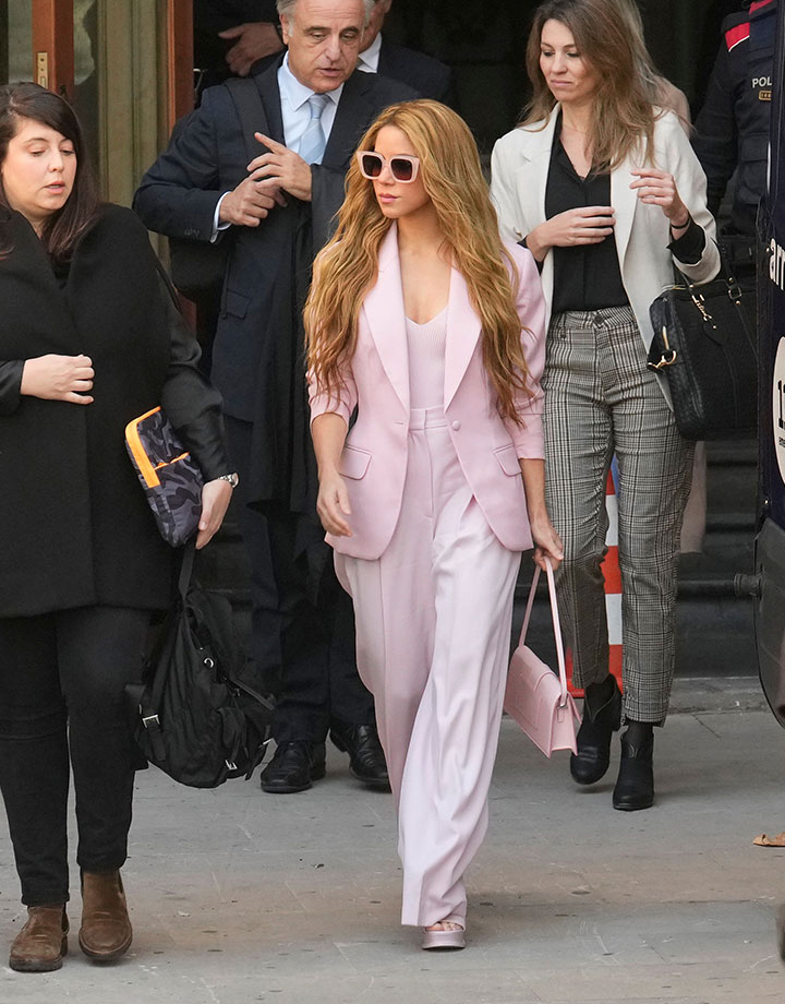 Shakira arrives in court Barcelona tax fraud trial pink suit