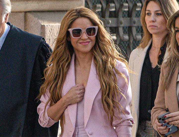 Shakira Barcelona court tax fraud trial pink suit sunglasses