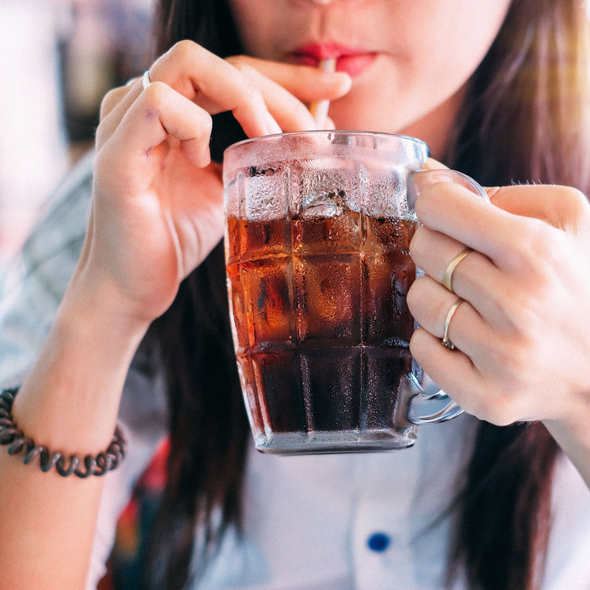 woman drinking soda