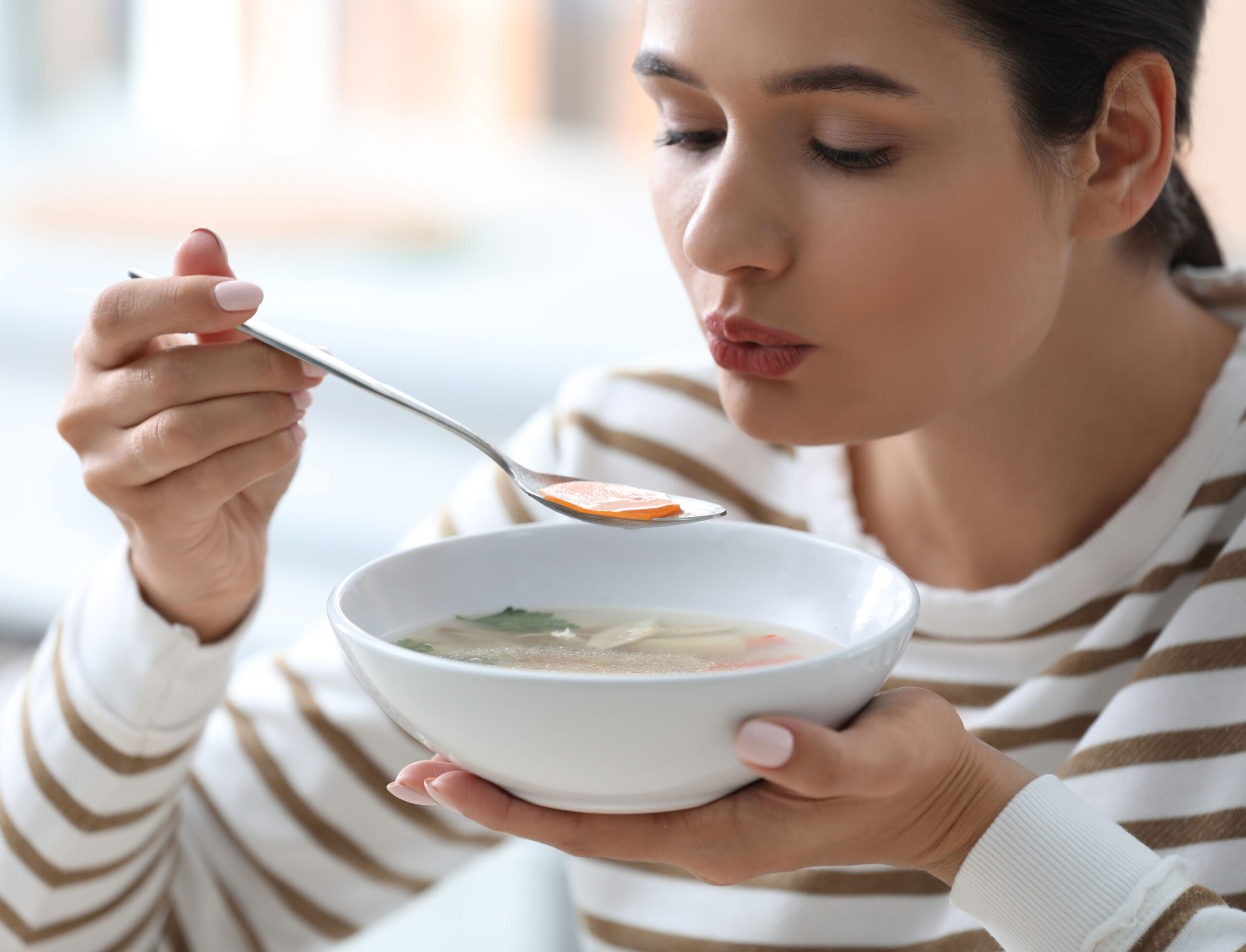 woman-eating-soup