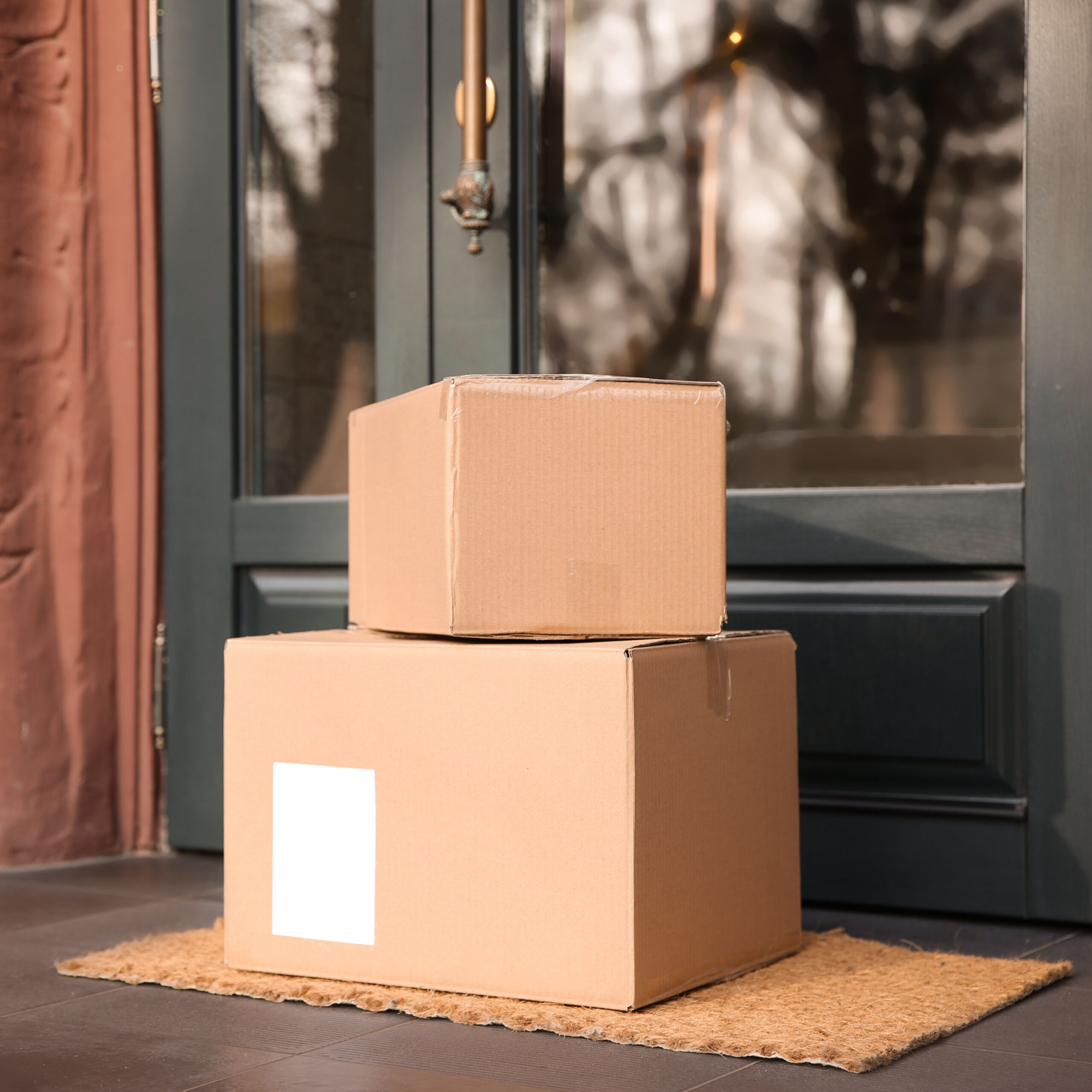 pile of packages on doorstep