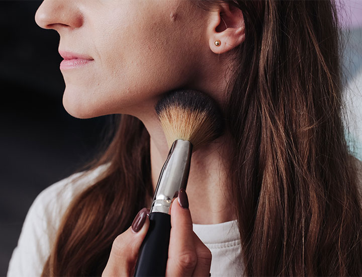 woman-blending-makeup-neck