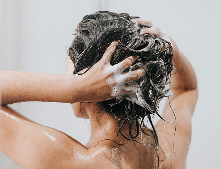 woman-shampooing-hair