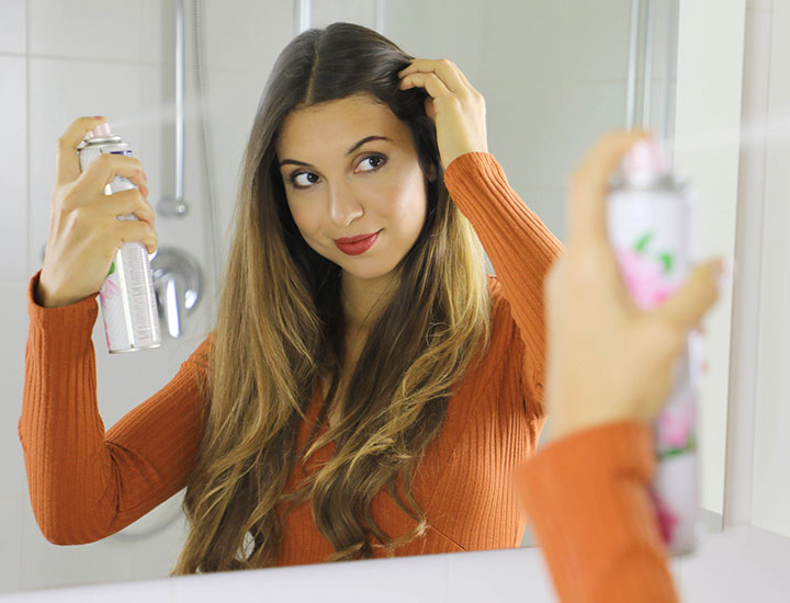 woman-using-root-lifting-spray