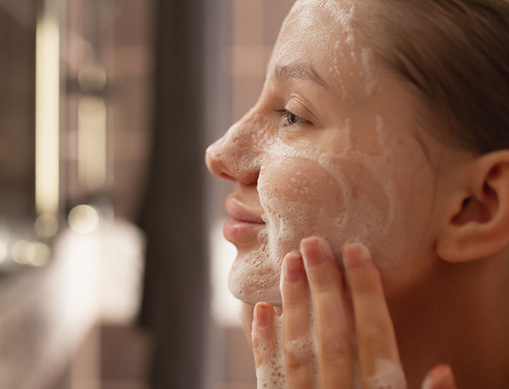 woman-washing-face