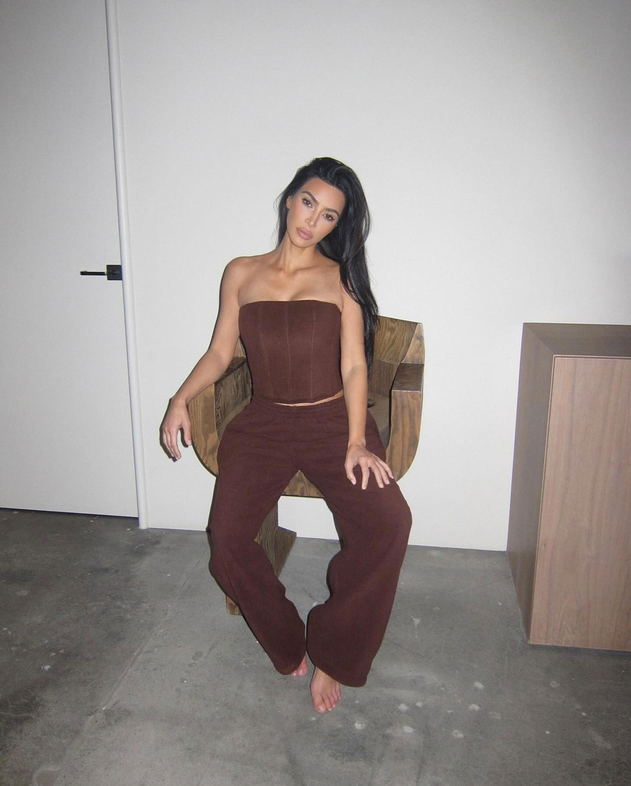 Kim Kardashian Models Espresso-Colored Bustier For Skims As Fans Flood Her  Comments Section With Snakes - SHEfinds