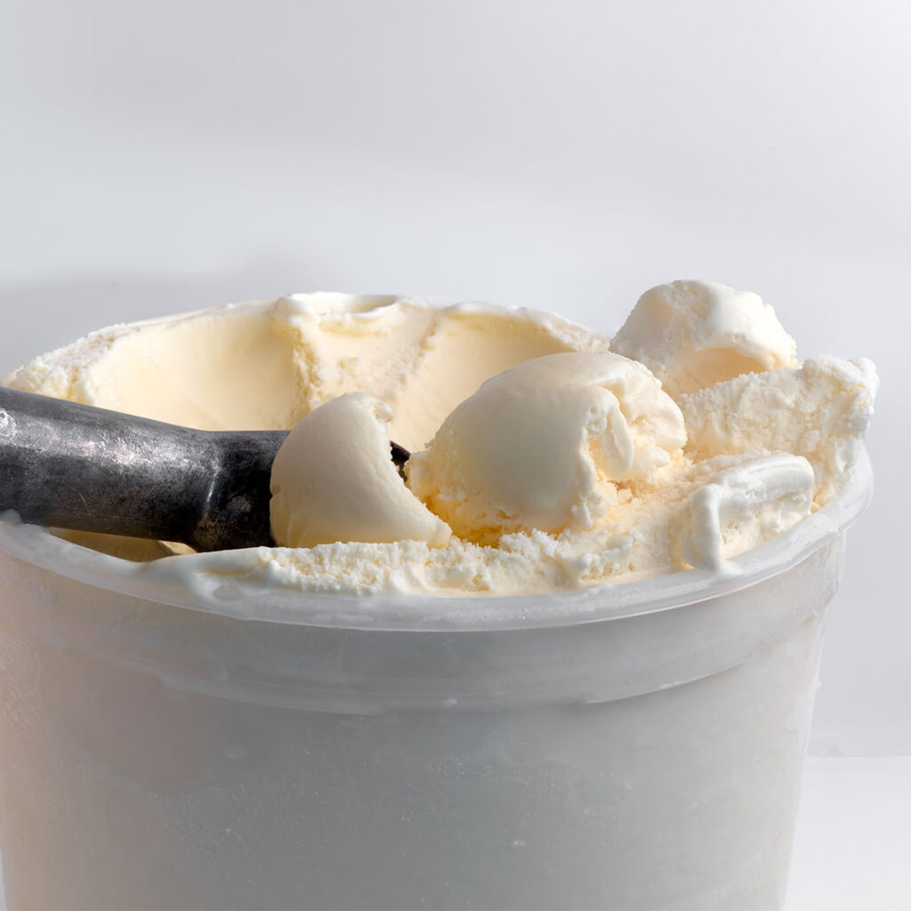 https://www.shefinds.com/files/2023/12/bucket-of-vanilla-ice-cream-with-scooper-1024x1024.jpg