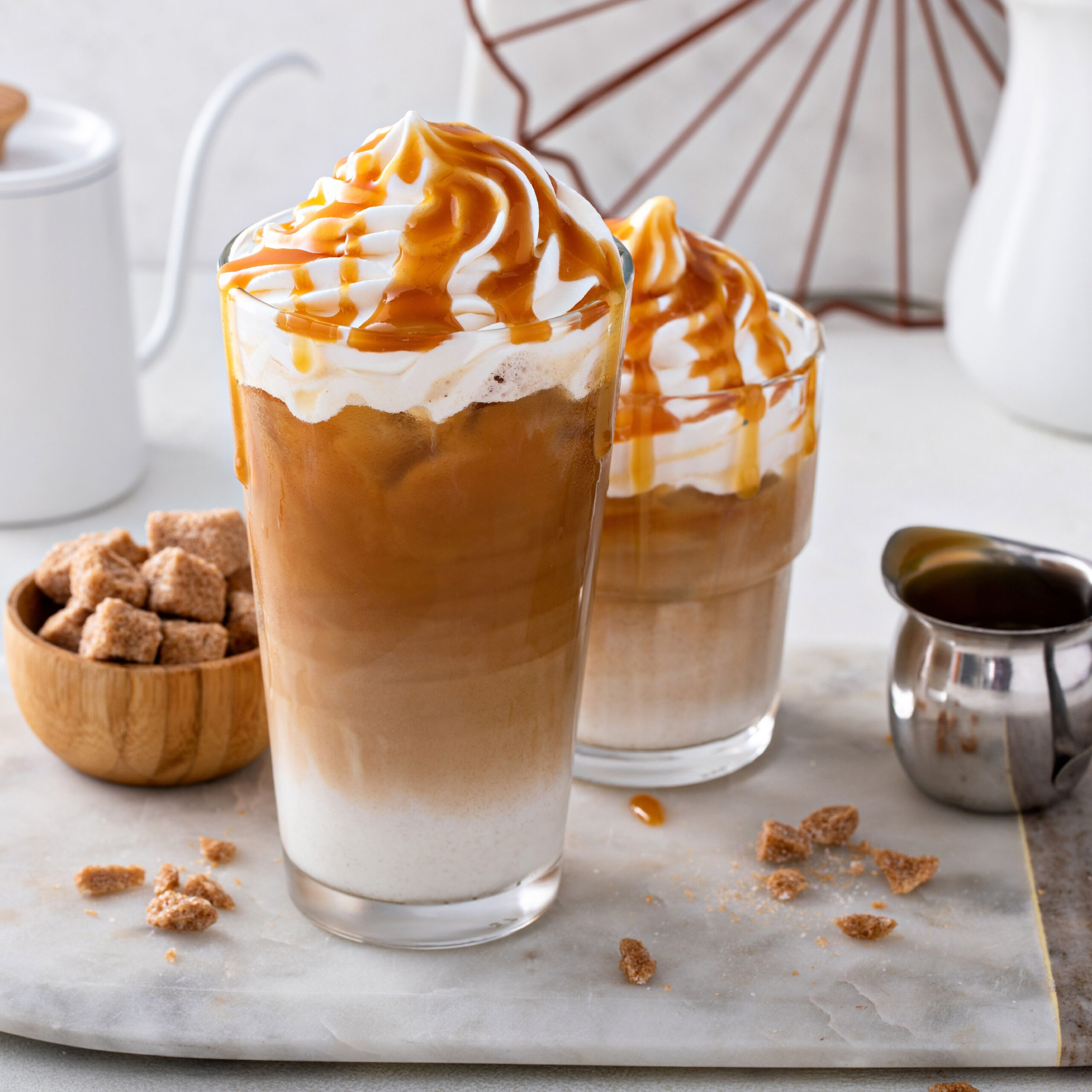 iced caramel lattes topped with whipped cream