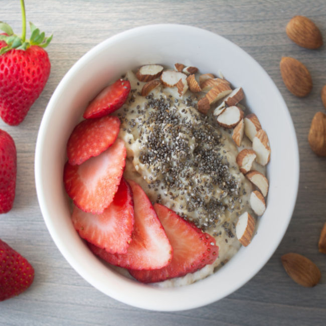 oatmeal topped with chia seeds and strawberries