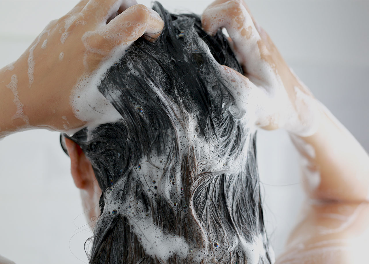 woman-shampooing-hair