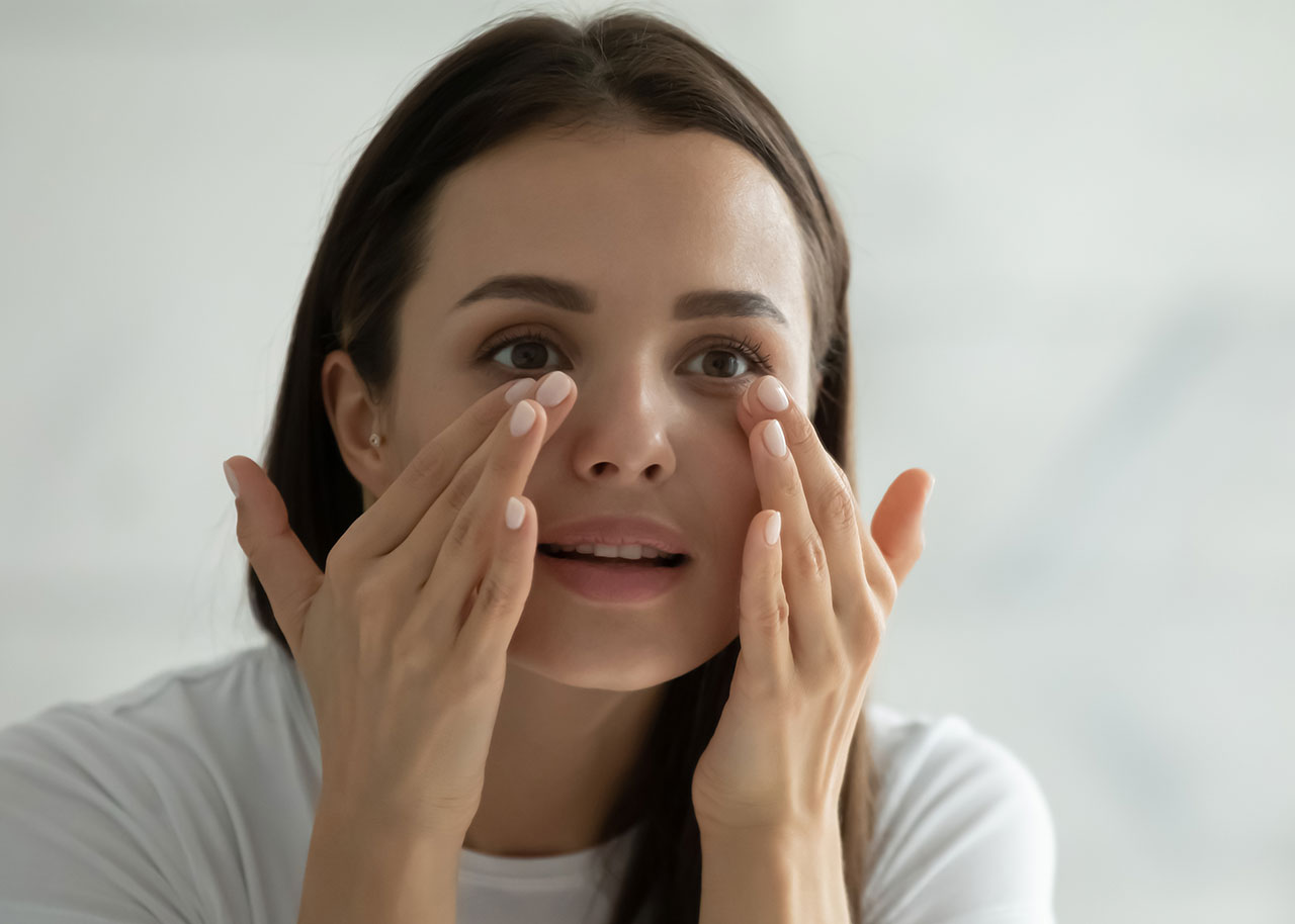 woman-patting-face-cream