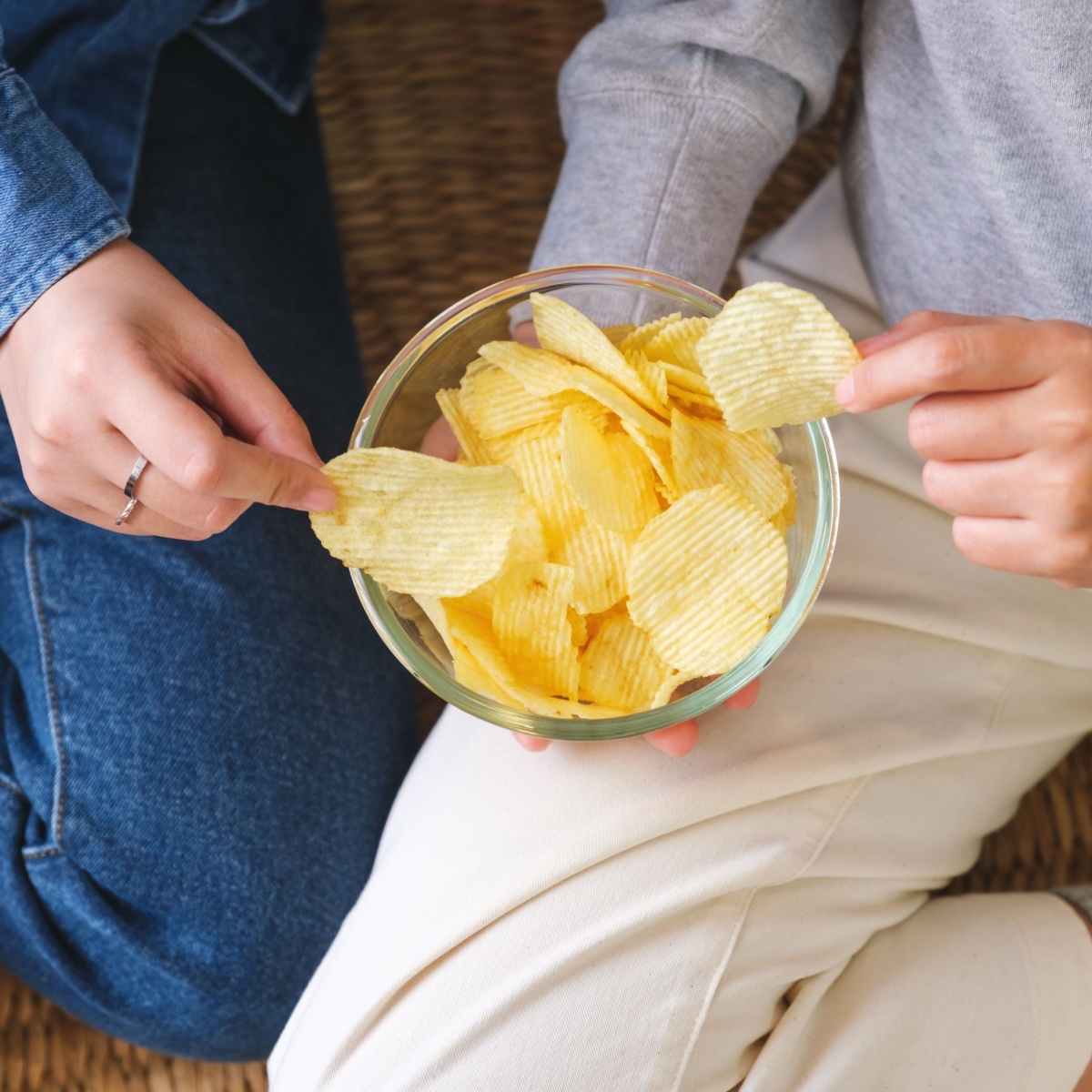 people eating potato chips