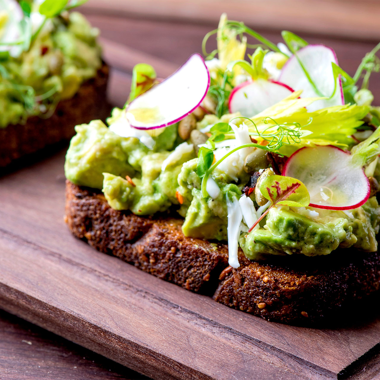 sprouted whole grain bread topped with avocado