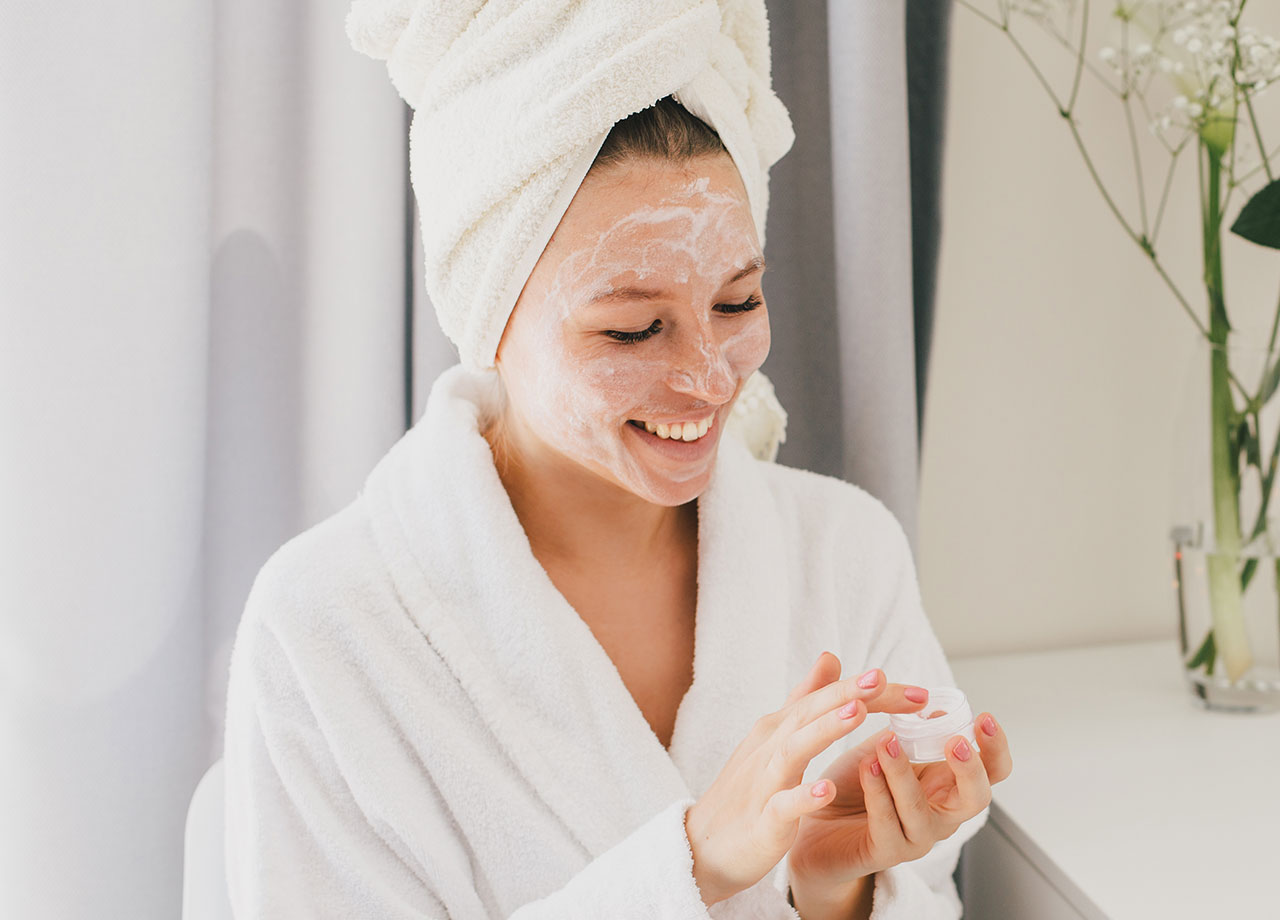 woman-applying-face-cream