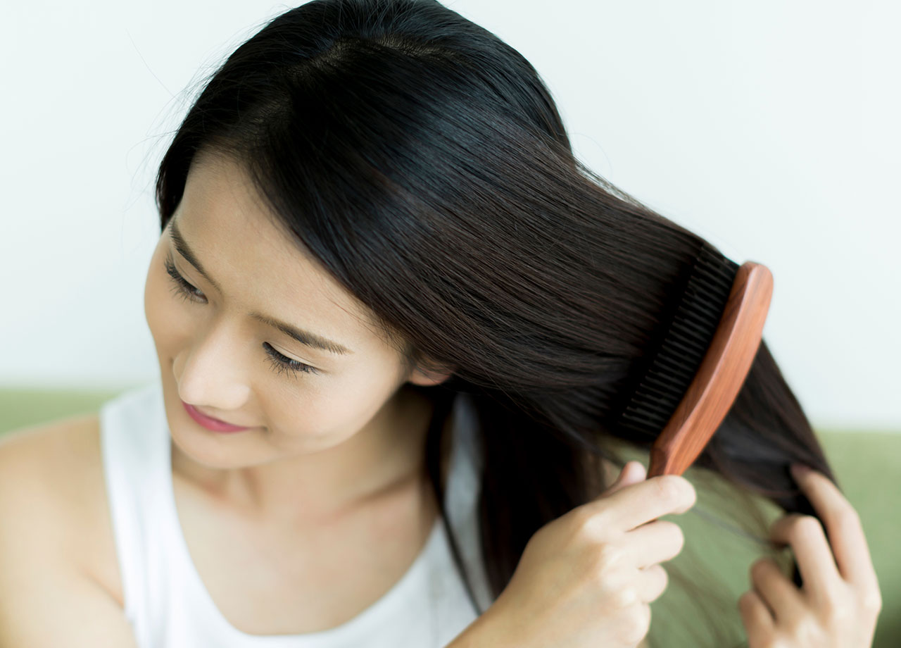 woman-brushing-hair