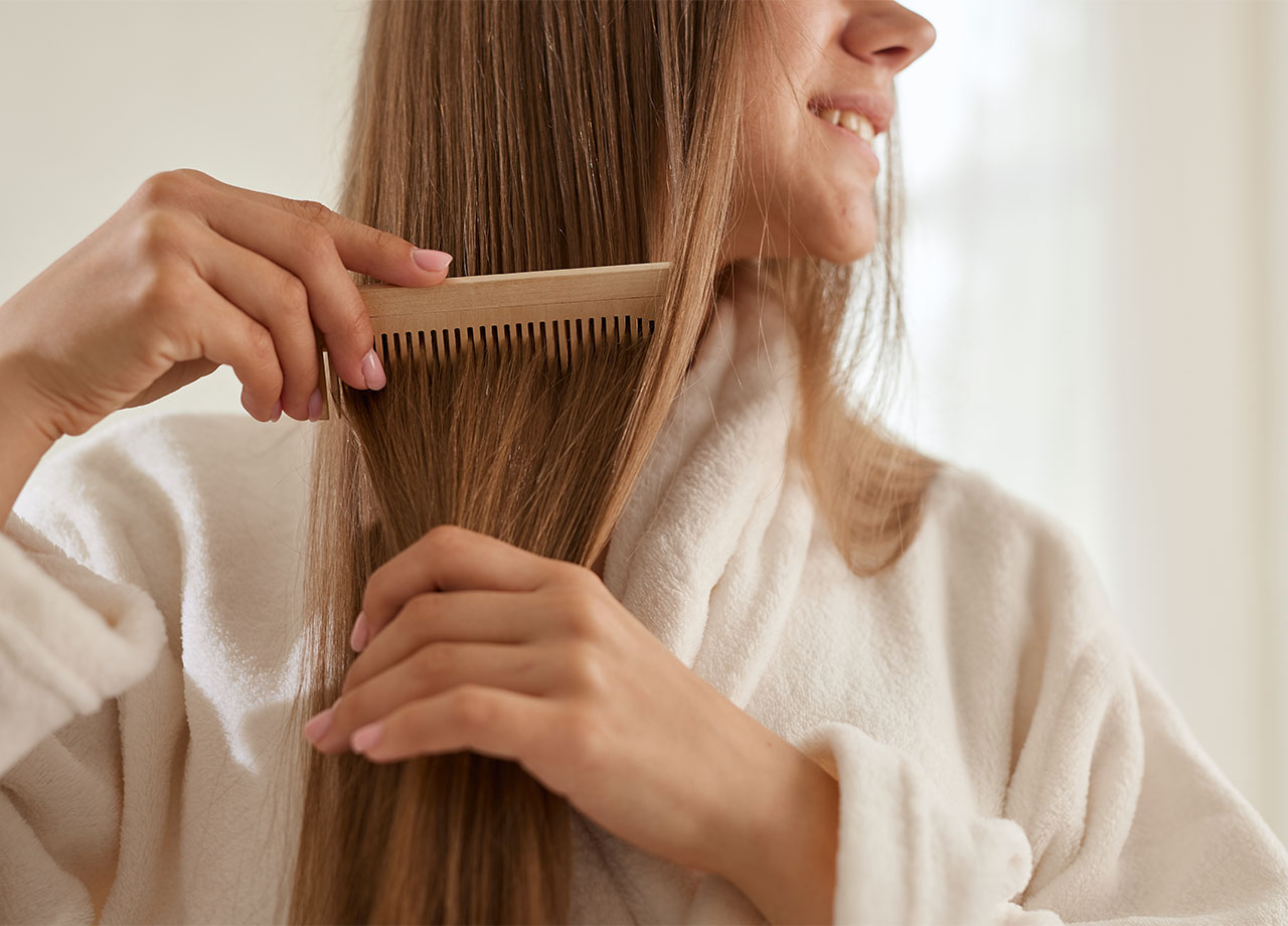 woman-combing-hair