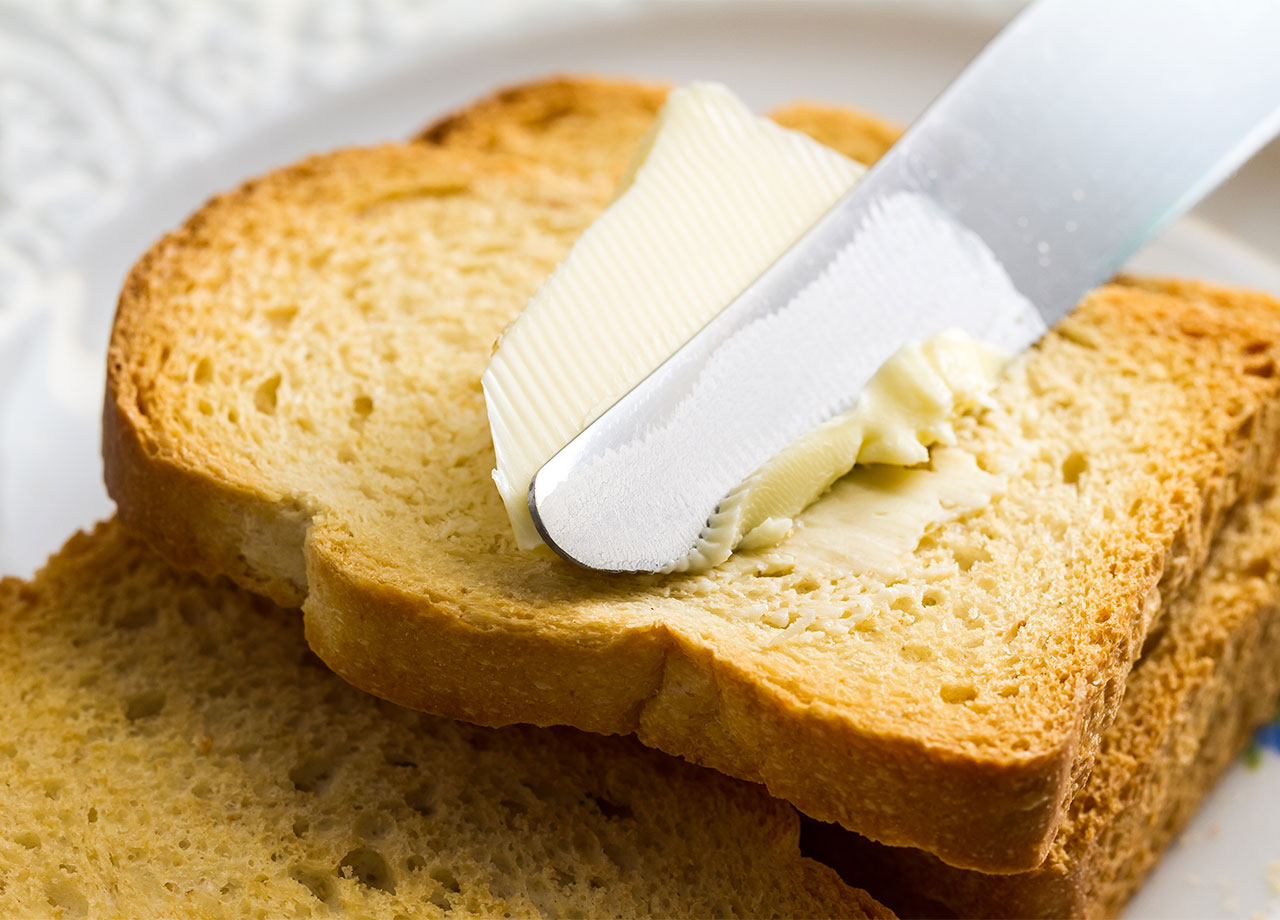 butter spreading on toast