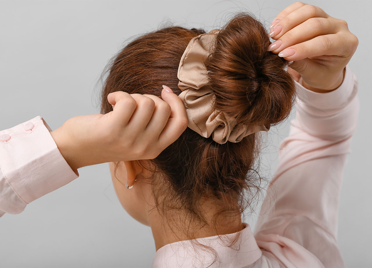 red-haired-woman-bun