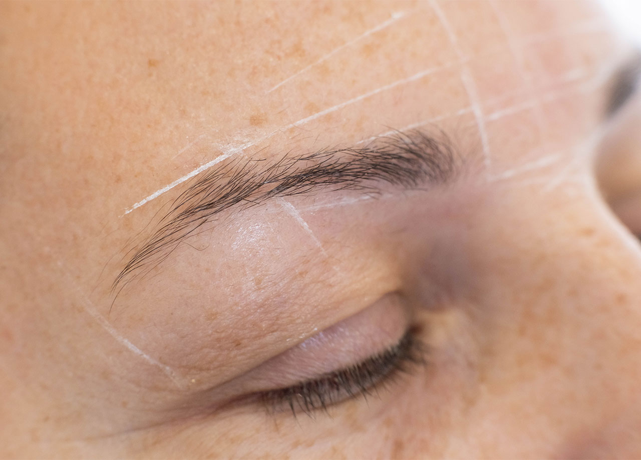 woman-getting-eyebrows-filled