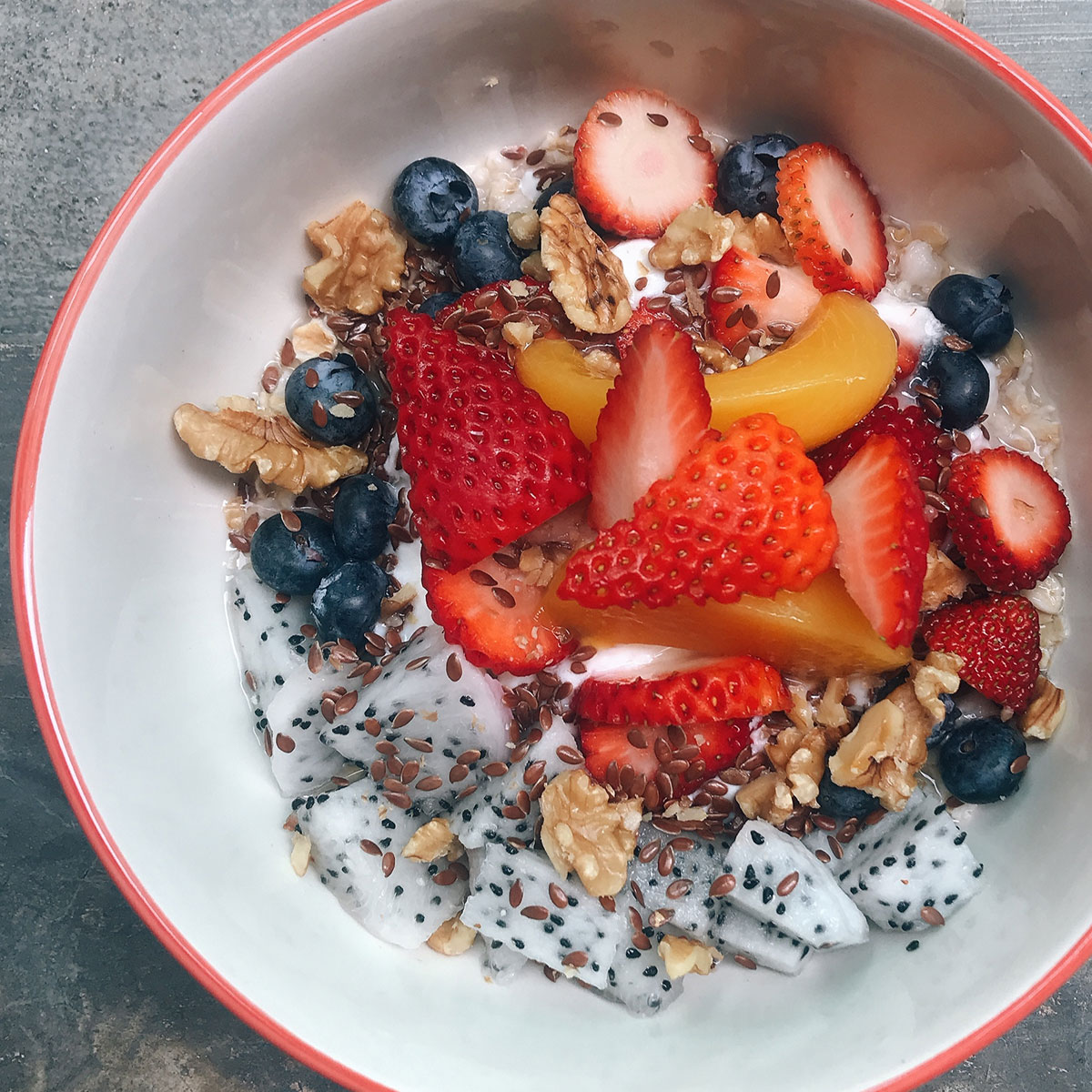 bowl of yogurt with lots of healthy toppings