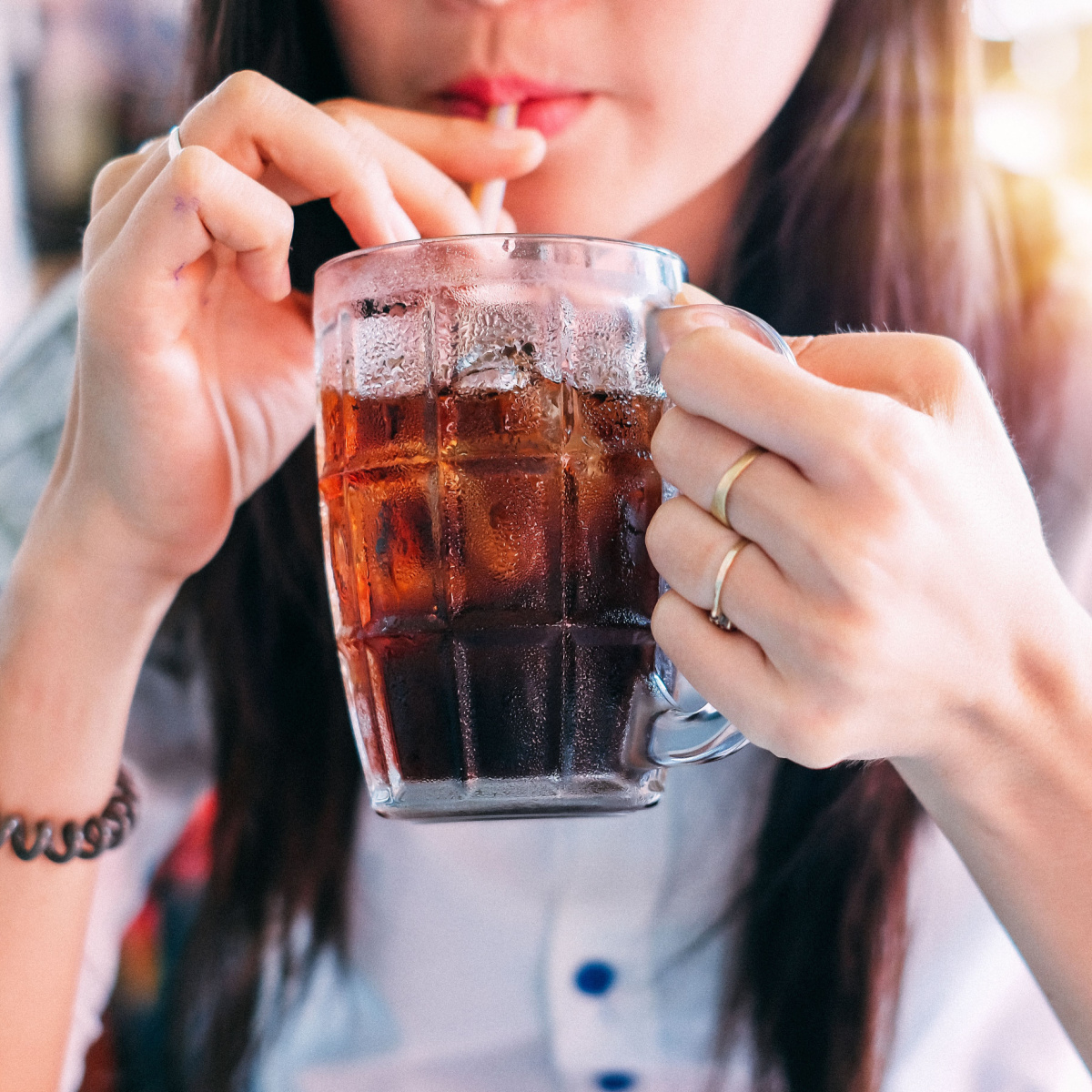 woman drinking soda